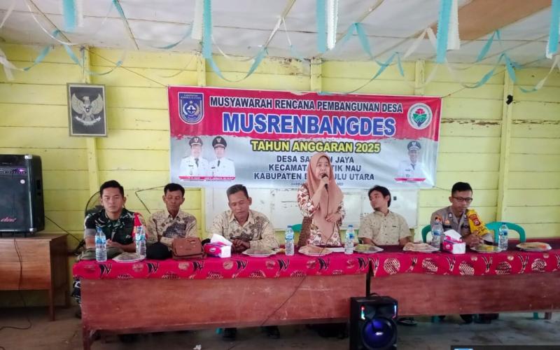 Polisi RW Menghadiri Kegiatan Musrenbangdes Tahun Anggaran 2025 di Balai Desa Samban Jaya