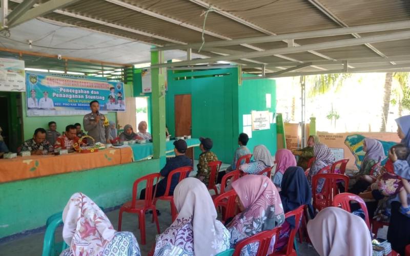 Bhabinkamtibmas Polsek Pino Hadiri Kegiatan Sosialisasi Pencegahan dan Penanganan Stunting di Desa Puding 