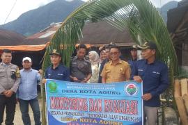 Bhabinkamtibmas Polsek Lebong Utara Hadiri Monitoring dan Evaluasi Penggunaan Dana Desa
