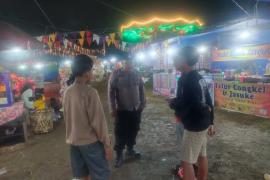 Patroli Malam, Polsek Giri Mulya Beri Imbauan Kepada Pengunjung Pasar Malam