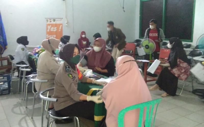 Sinergi Bersama PMII dan STIT, Polres BS Gelar Vaksinasi