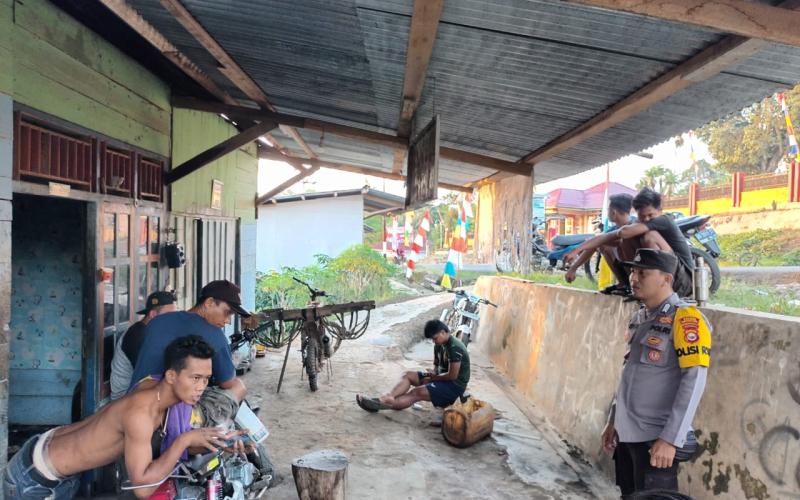 Polisi RW Polsek Giri Mulya Sampaikan Imbauan Kamtibmas kepada Masyarakat desa Wonoharjo