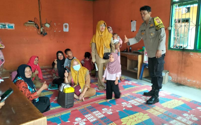 Dukung Percepatan Penurunan Stunting, Bhabinkamtibmas Sambangi Posyandu