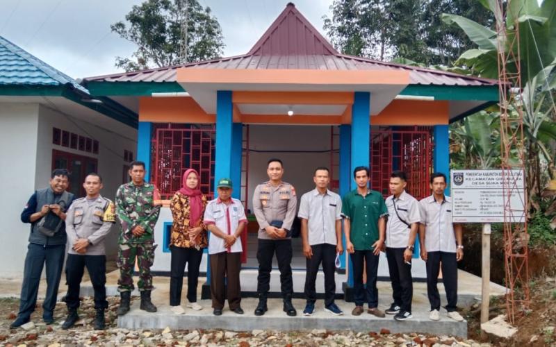 Kapolsek Giri Mulya Melaksanakan Monev Pembangunan Fisik TA 2023 di Desa Suka Mulya
