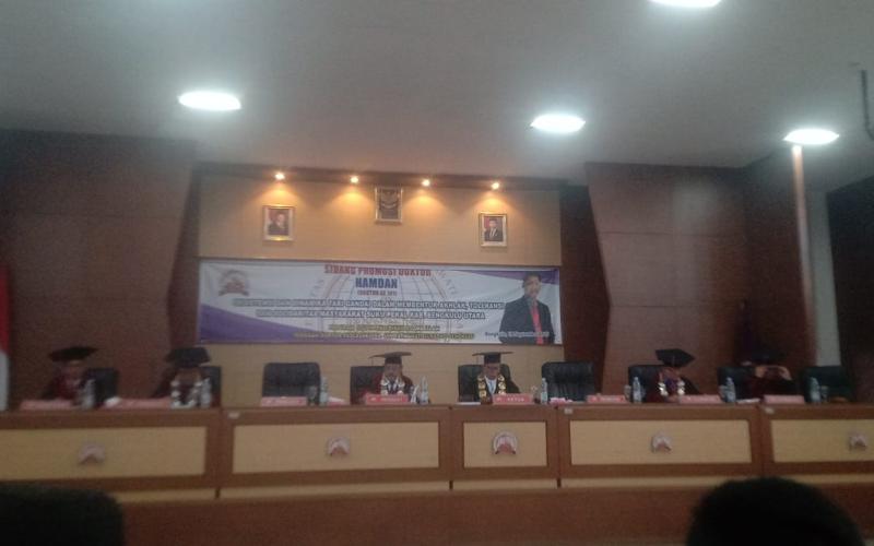 Suara Serunai Suku Pekal Menggema di Ruang Promosi Doktor Hamdan