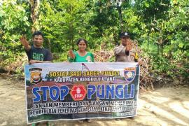Cegah Pungli, Bhabinkamtibmas Polsek Enggano Sosialisasi Saber Pungli 