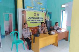 Kasat Binmas Polres BS Berikan Pelatihan Peningkatan Kemampuan Angoota Satkamling Desa Kota Agung  