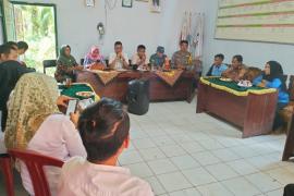 Bhabinkamtibmas Polsek Lais Hadiri Acara Musyawarah Pra Monitoring dan Evaluasi Pembangunan Desa Langu