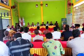 Bhabinkamtibmas Polsek Air Besi Hadiri Pelantikan Pejabat Kepala Desa Talang Lembak