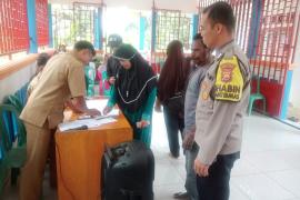 Polsek Giri Mulya Awasi Penyaluran BLT DD Desa Suka Mulya 