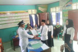 Dukung Jalannya Pemerintahan Desa, Kapolsek Lais Hadiri Pelantikan Perangkat Desa Kembang Manis