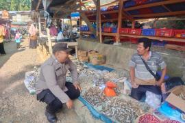 Jelang Nataru, Polsek Giri Mulya Pastikan Pasar Pekan Aman Kondusif