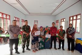 Polsek Giri Mulya Awasi Pembagian BLT DD di Desa Wonoharjo
