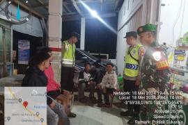 Polsek Sukaraja Bersama Koramil 0425-03 Air Periukan Patroli Gabungan Ciptakan Sitkamtibmas yang Aman dan Kondusif