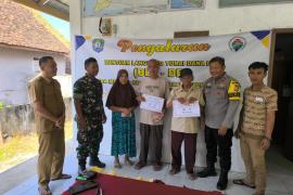 Bhabinkamtibmas Polsek Nasal Monitoring Dan Pengawasan Penyaluran Bantuan Langsung Tunai Desa Merpas