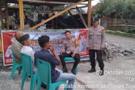 Bhabinkamtibmas Polsek Sindang Kelingi Laksanakan Minggu Kasih, Ajak Warga Jaga Kamtibmas 